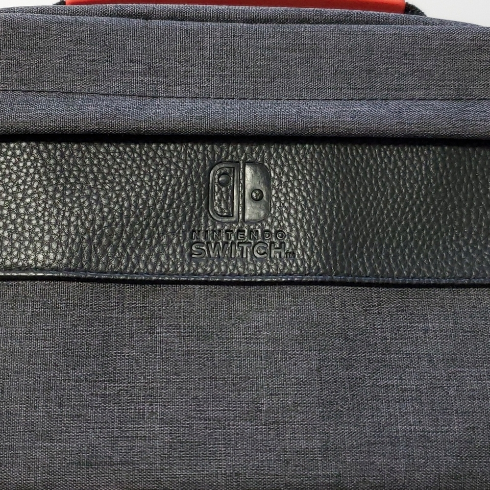 Nintendo switch carrying case. Grey and black.